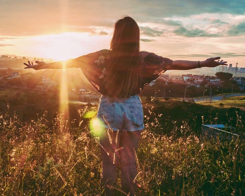 Woman on Mountain with Openhand